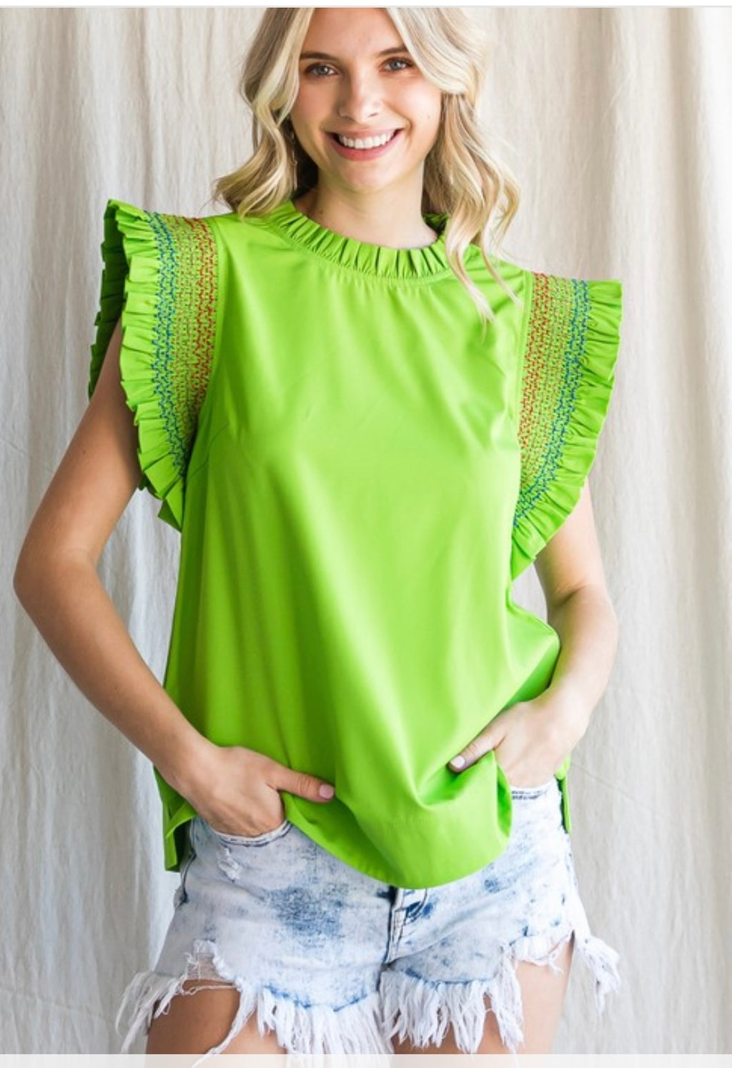 Lime, green top with multicolored stitching