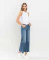 MID RISE RAW HEM WIDE LEG JEANS