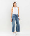 MID RISE RAW HEM WIDE LEG JEANS