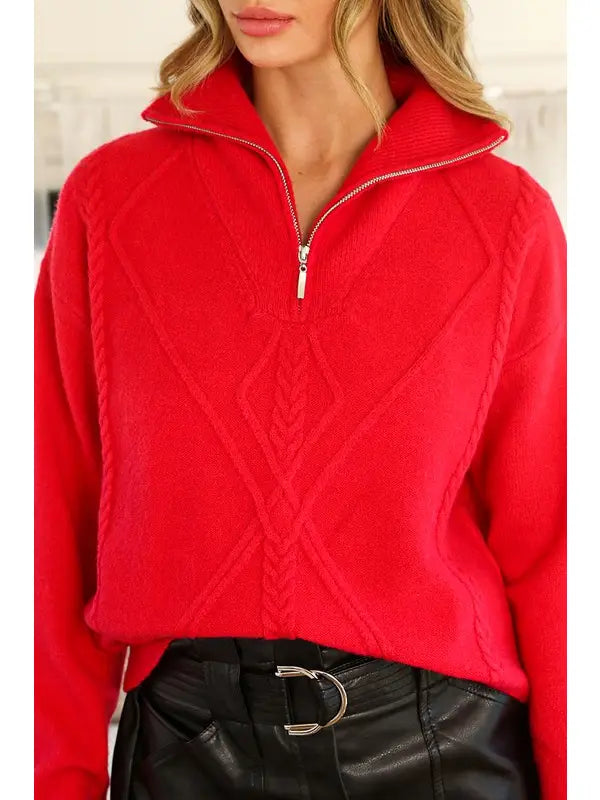 Textured half zip pullover sweater.