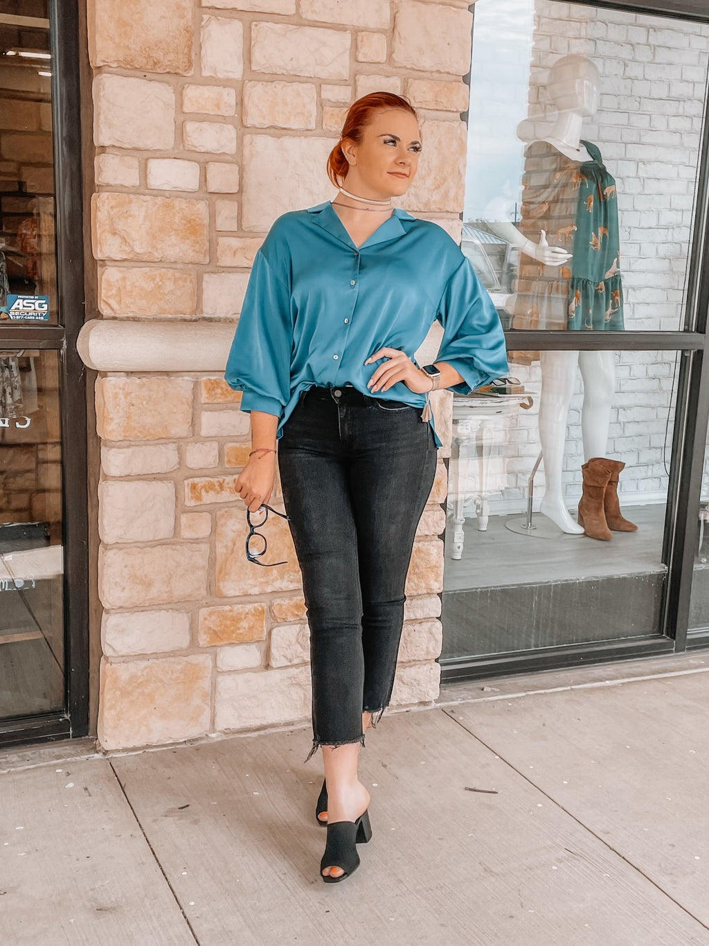 Teal blouse with three-quarter length sleeve