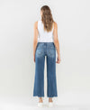 MID RISE RAW HEM WIDE LEG JEANS