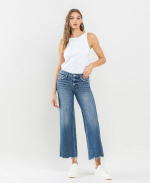 MID RISE RAW HEM WIDE LEG JEANS