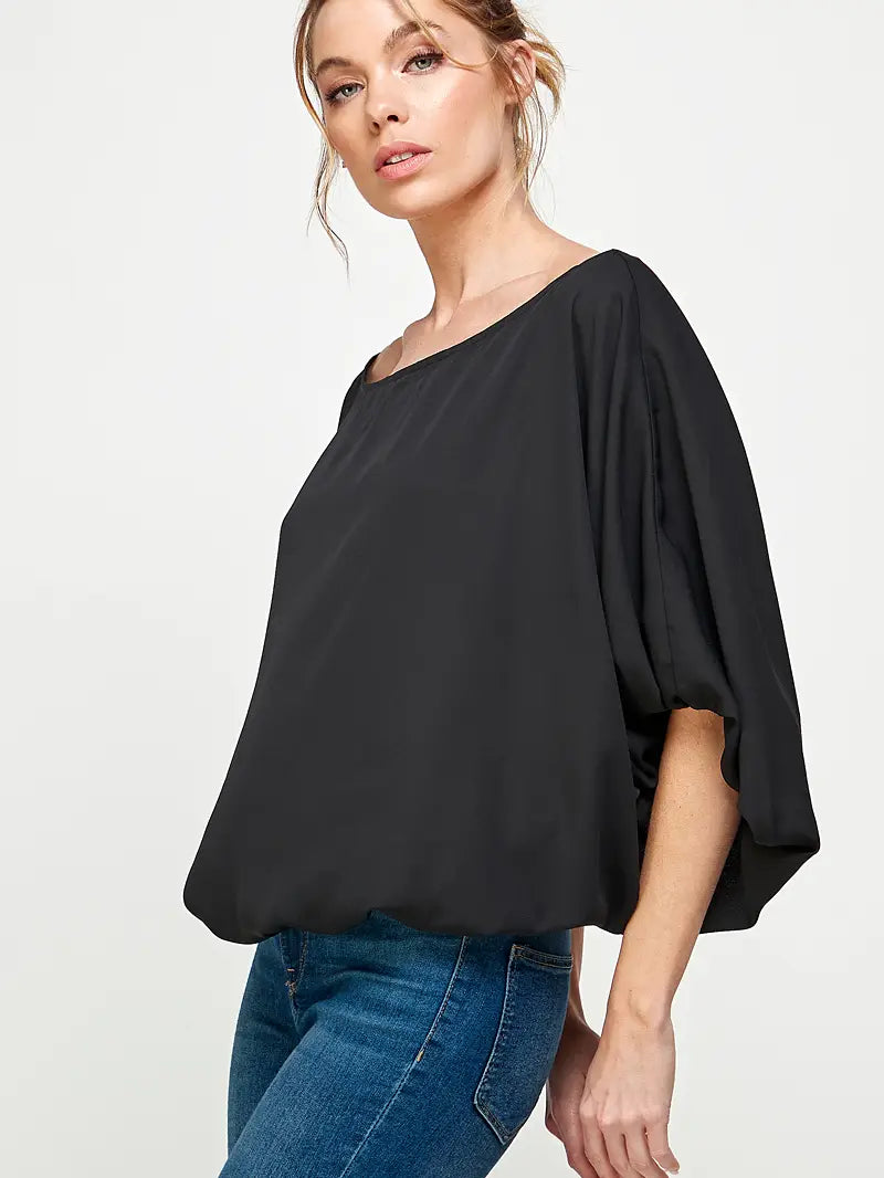 Dolman sleeve off the shoulder slash on the shoulder