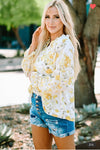 Yellow floral blouse