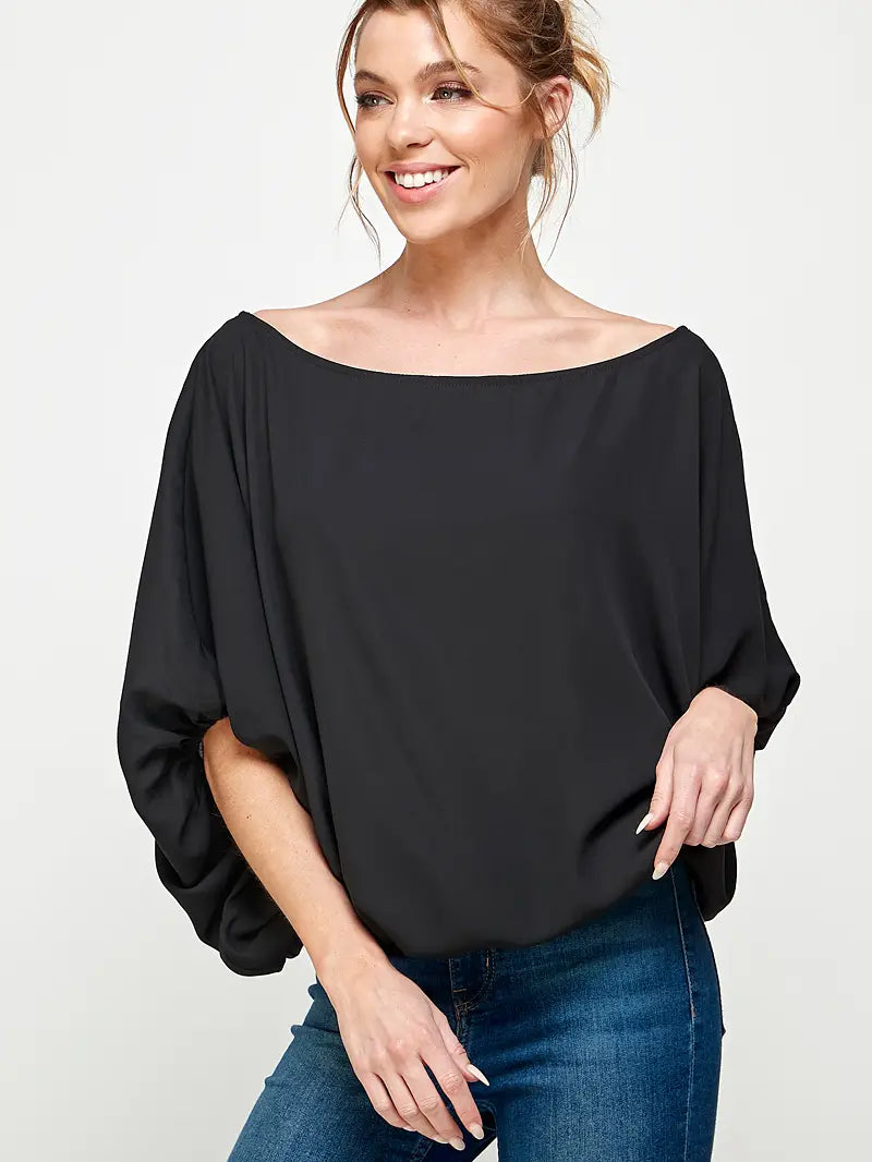 Dolman sleeve off the shoulder slash on the shoulder